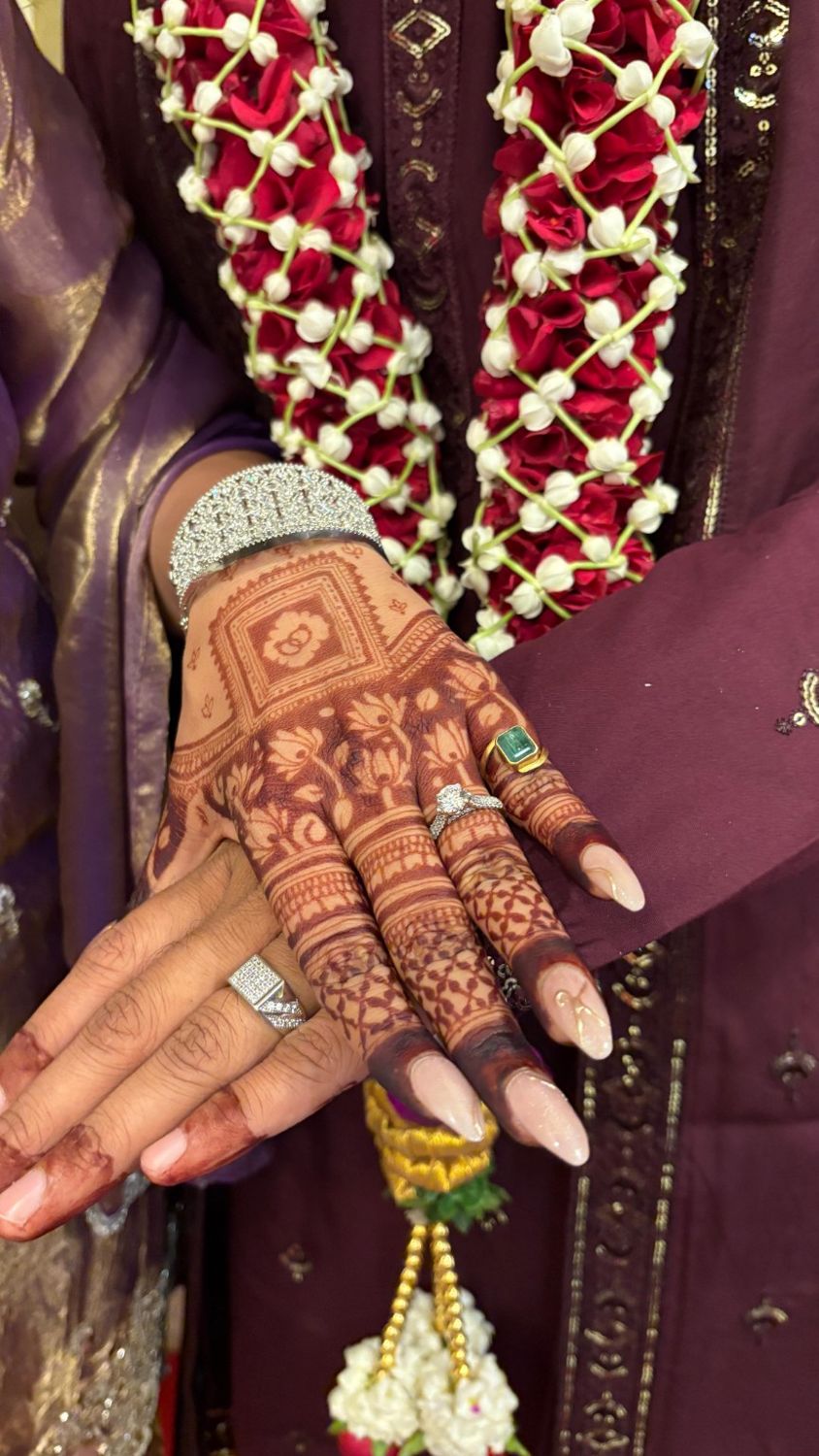 Chanchal's ring and mehendi with the flower garlands